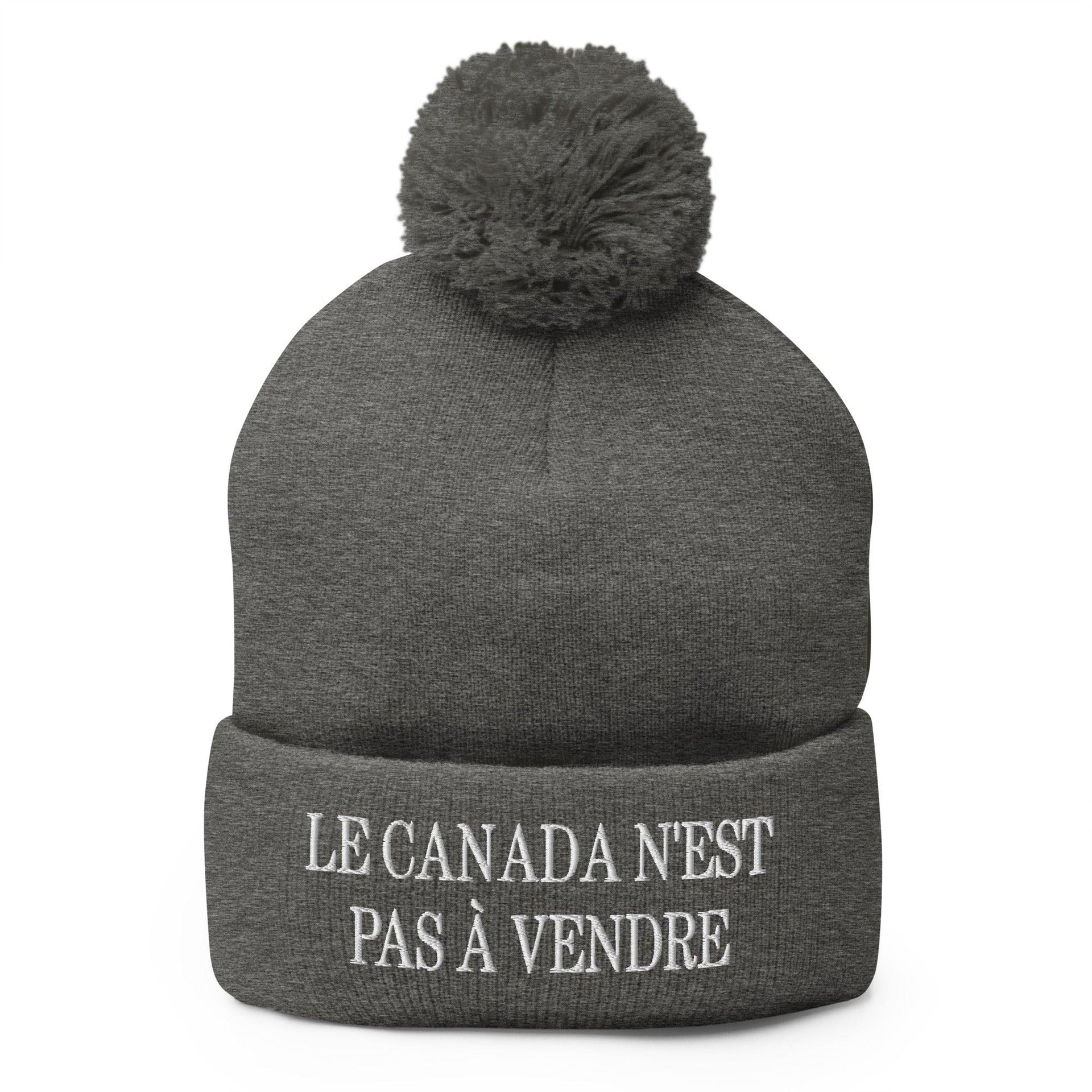 Le Canada n'est pas à Vendre Canada is not for Sale Embroidered Knit Pom Pom Beanie Dark Heather Grey Beanies Canada Canada Is Not For Sale Capital Crowns