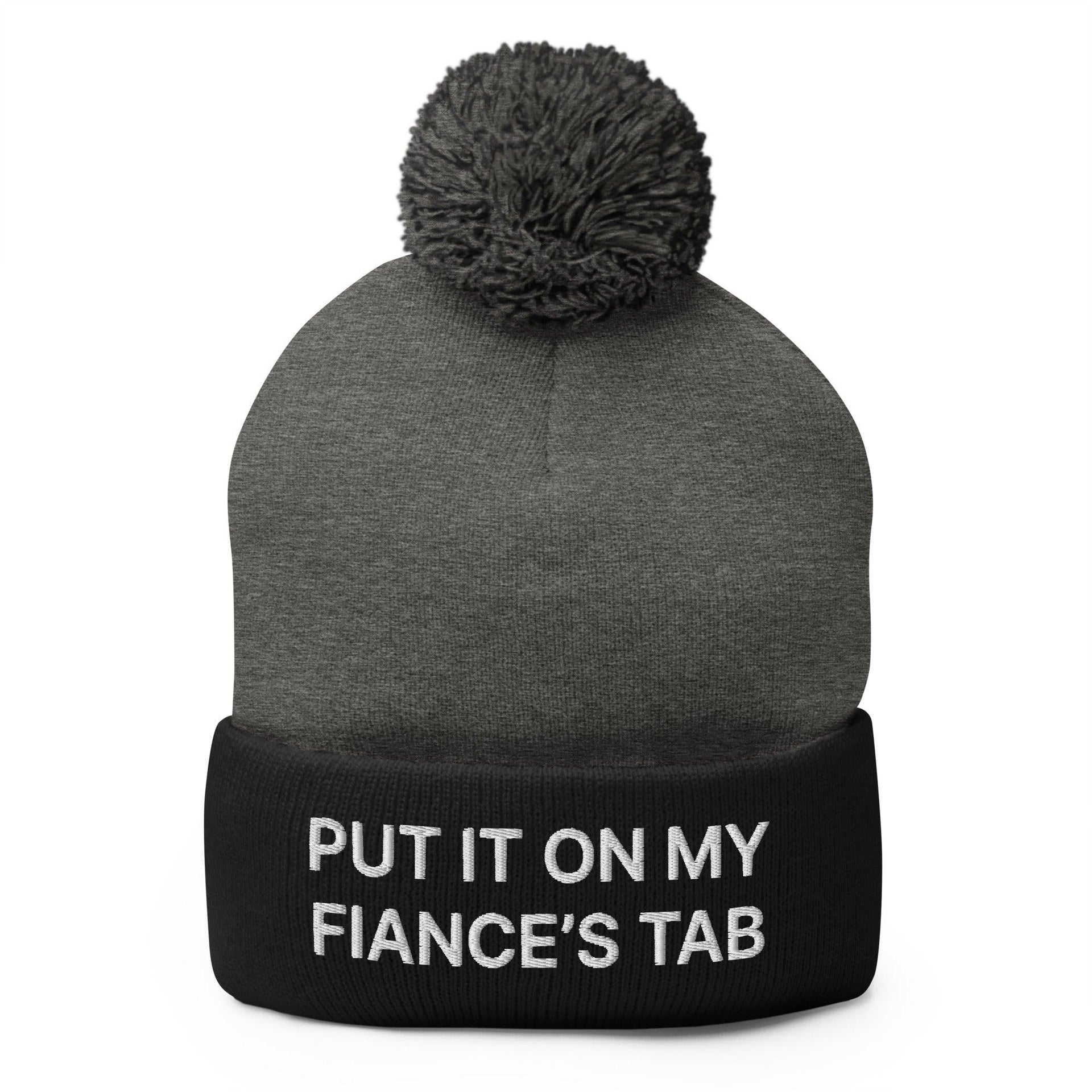 Put It on My Fiance's Tab Embroidered Knit Pom Pom Beanie Dark Heather Grey Black Beanies Capital Crowns Funny
