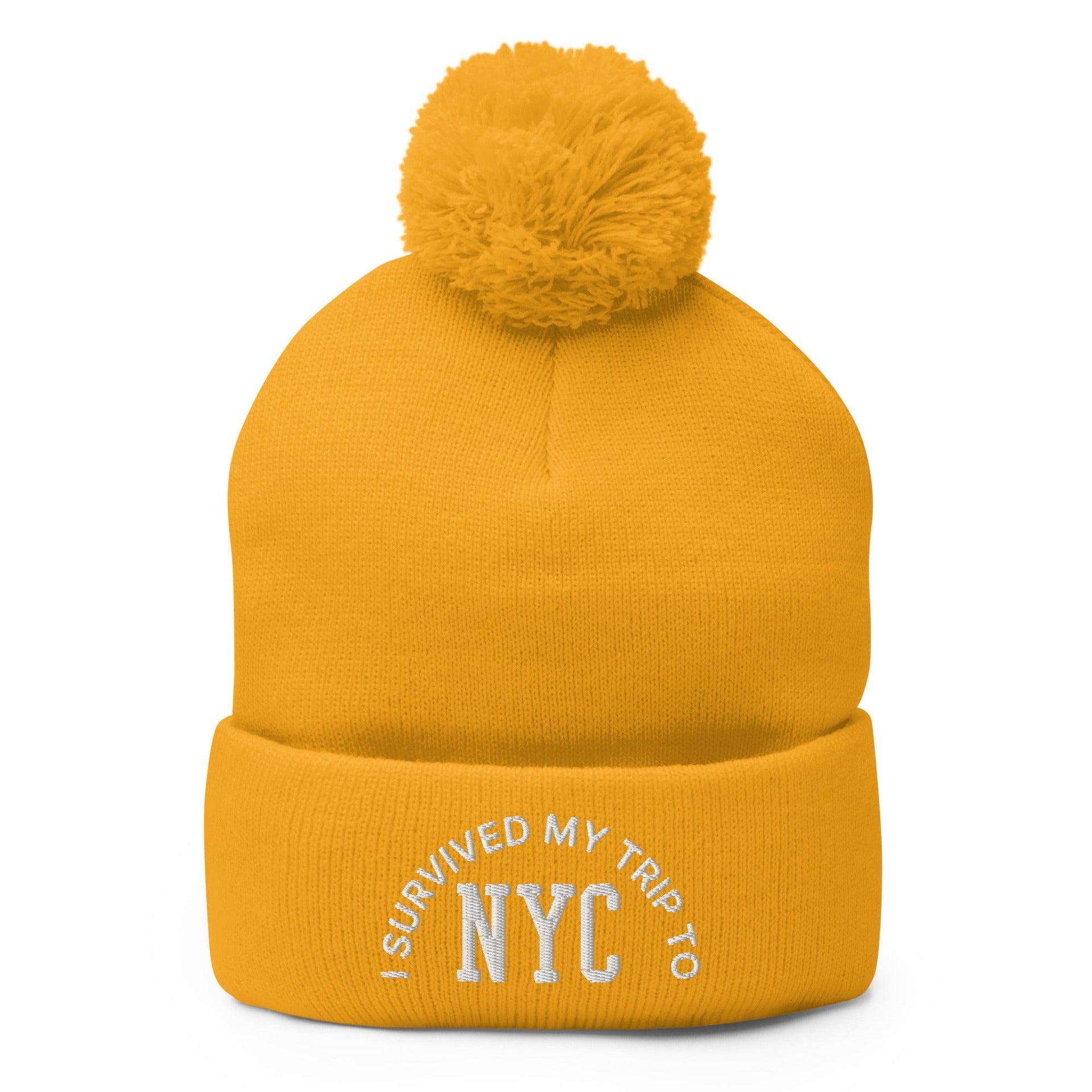 I Survived My Trip to NYC Embroidered Knit Pom Pom Beanie Gold Beanies Capital Crowns New York City NY NYC