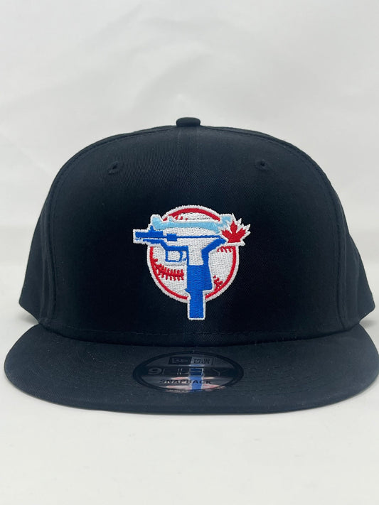 Urban Edge Snapback with Emblematic Shield Design - Black - fanart Black AdjustableSnapback Bjs BlackFlatBillHat Blue Jays Blue Jays fan Blue Jays team CanadianFlagBaseballHat EmblemShieldHat HipHopStyleCap I HEart Bjs I love Bjs NationalPrideSportswear New Era NewEraSnapback Snapback StreetStyleHeadwear Toronto Bjs Toronto Blue Jays UnisexBaseballCap UrbanSnapbackCap