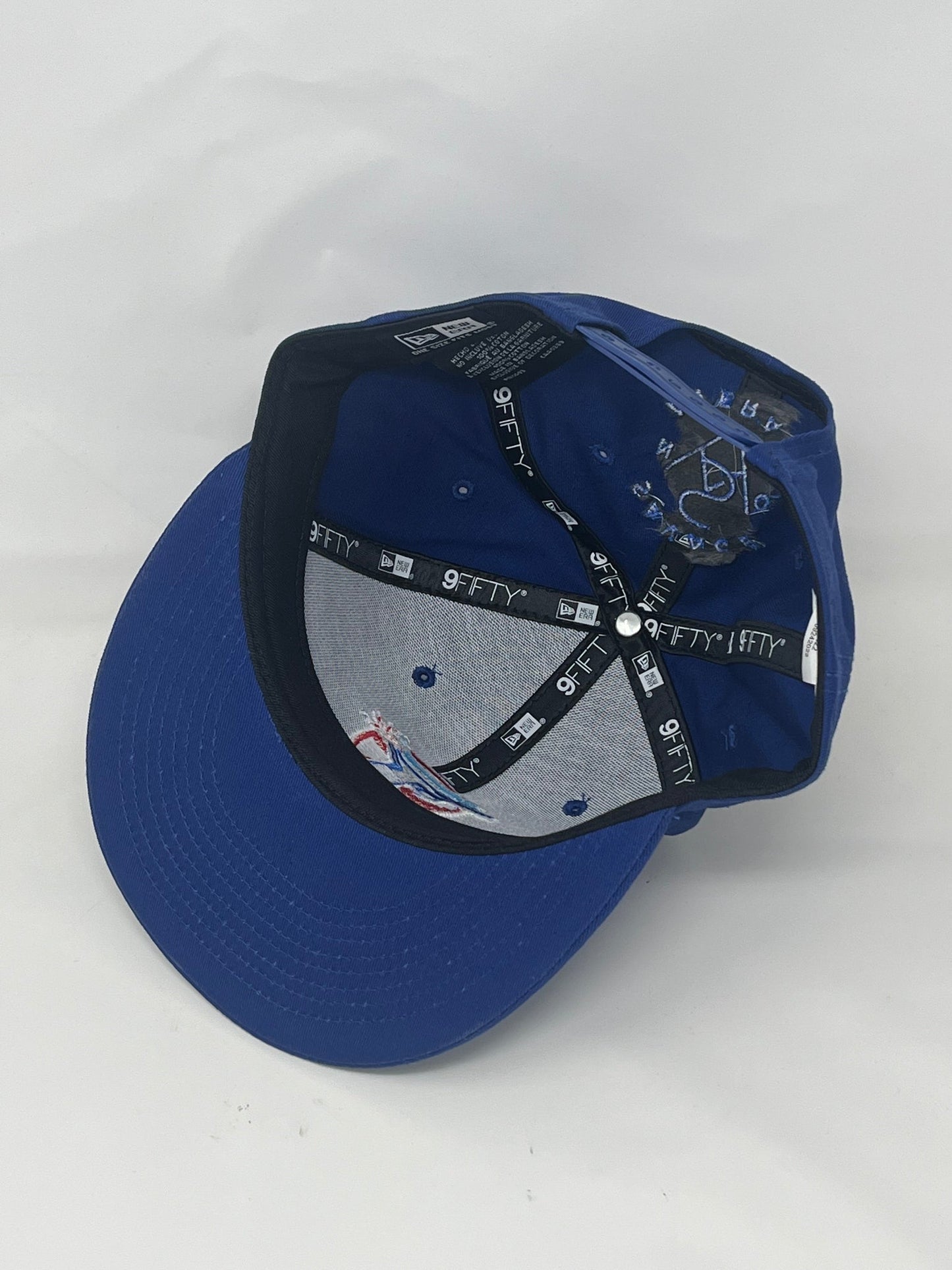 Urban Edge Snapback with Emblematic Shield Design - Royal