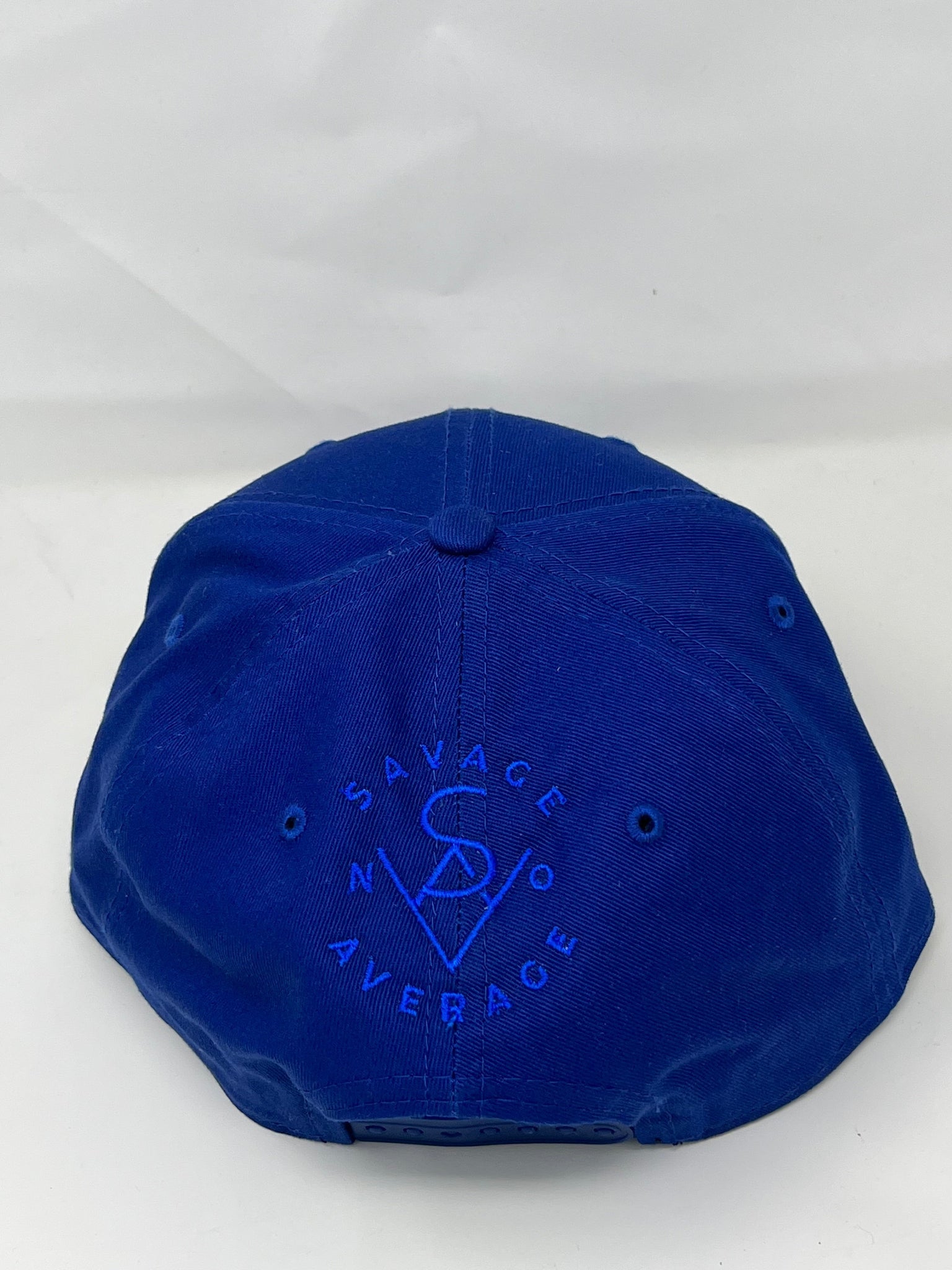 Urban Edge Snapback with Emblematic Shield Design - Royal